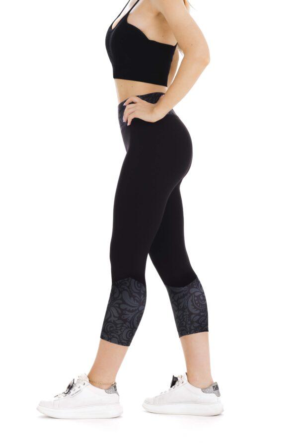 Črne capri pajkice Incendio s srebrnim vzorcem na dnu hlačnic