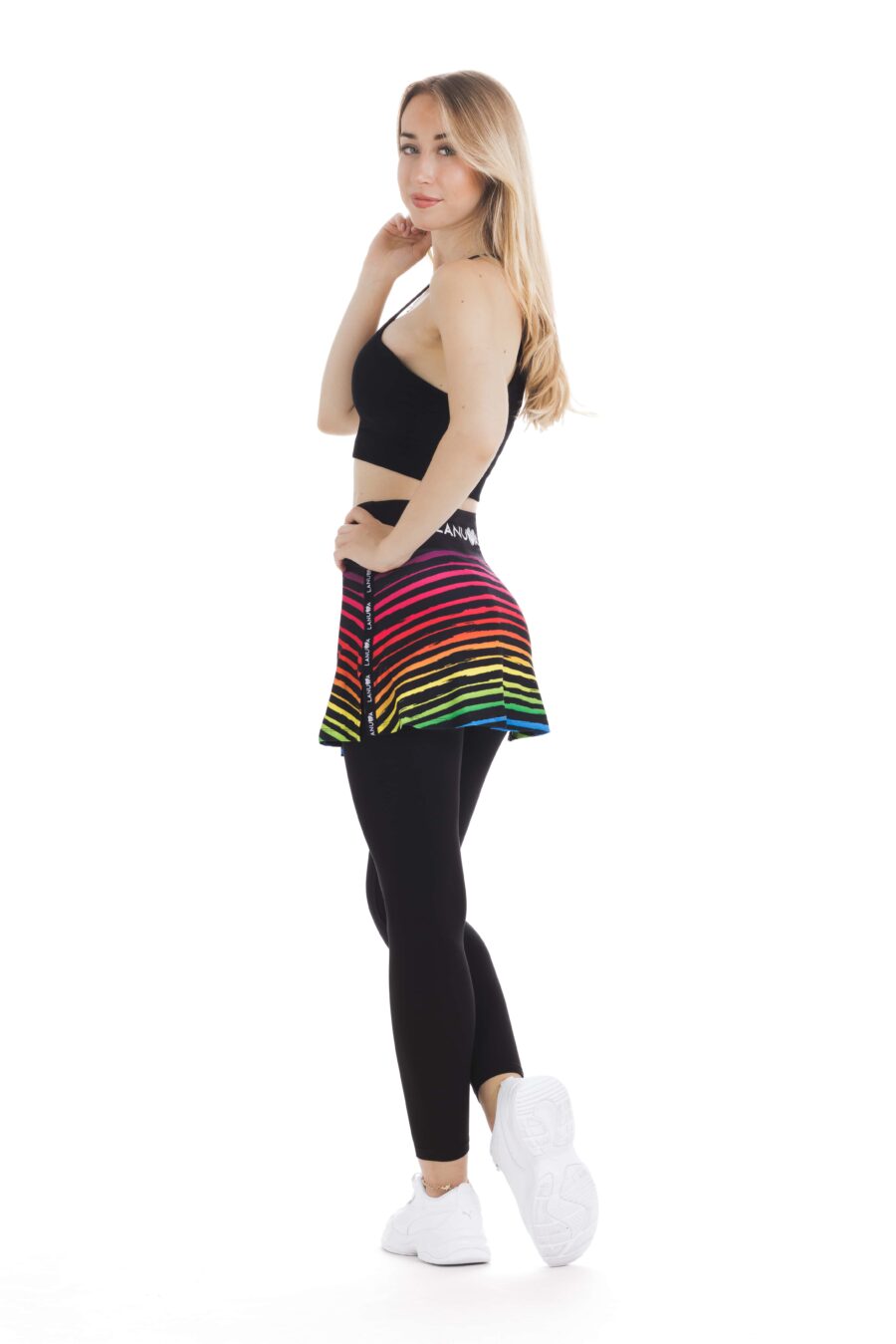 Skort Ritmica - krilo z všitimi pajkicami z živahnim mavričnim vzorcem