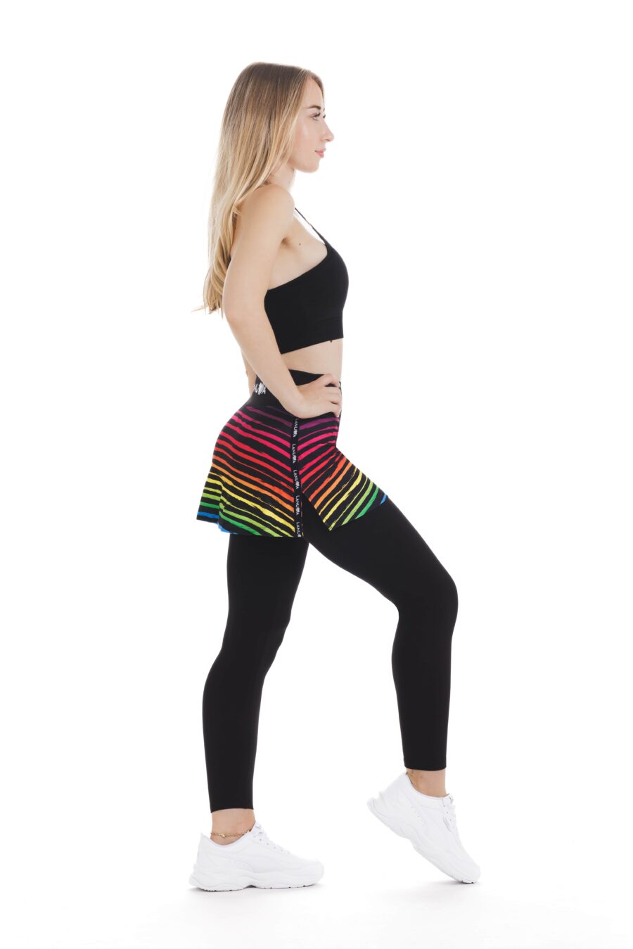 Skort Ritmica - krilo z všitimi pajkicami z živahnim mavričnim vzorcem