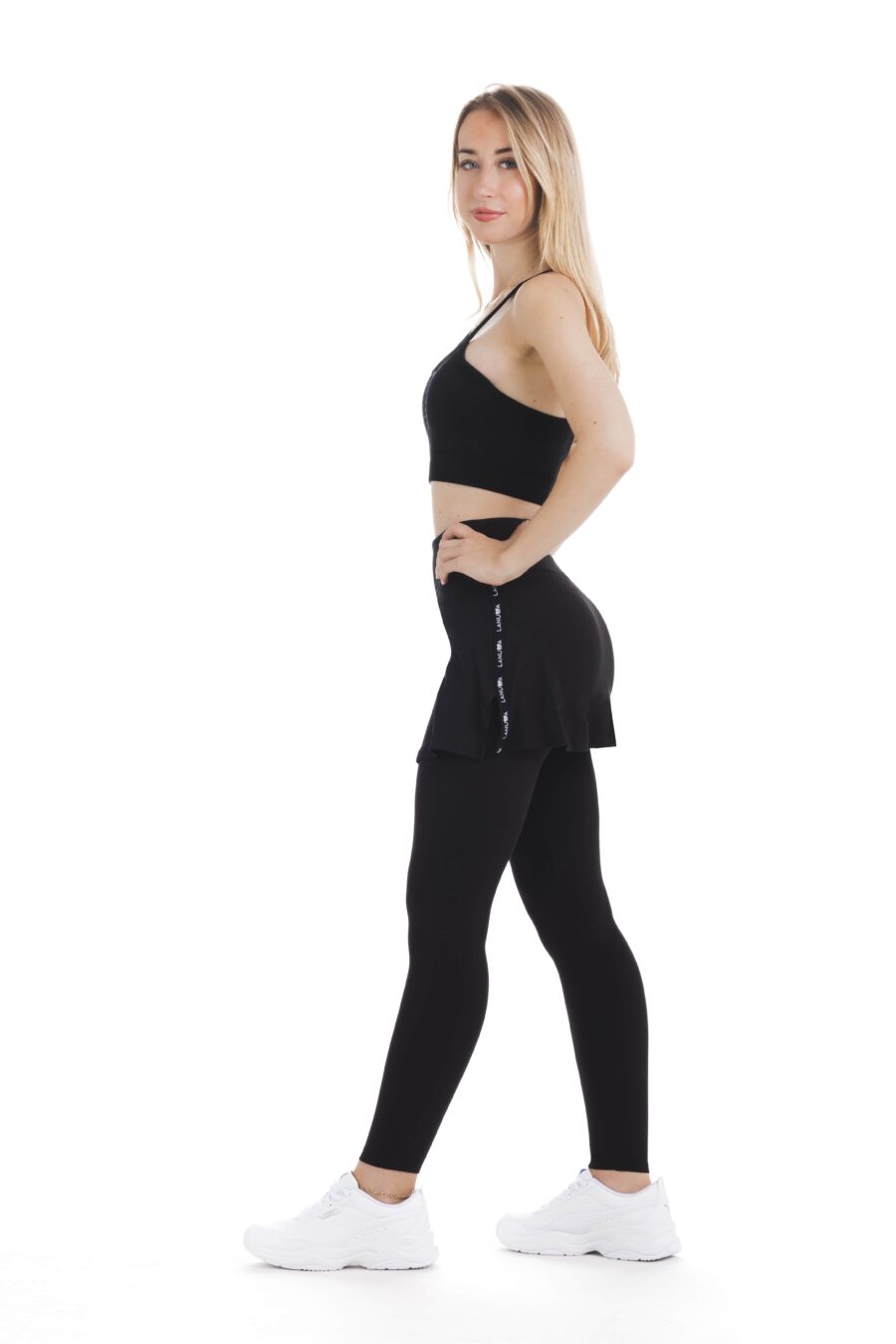 Skort Black long- enobarvno krilo z všitimi pajkicami v črni barvi