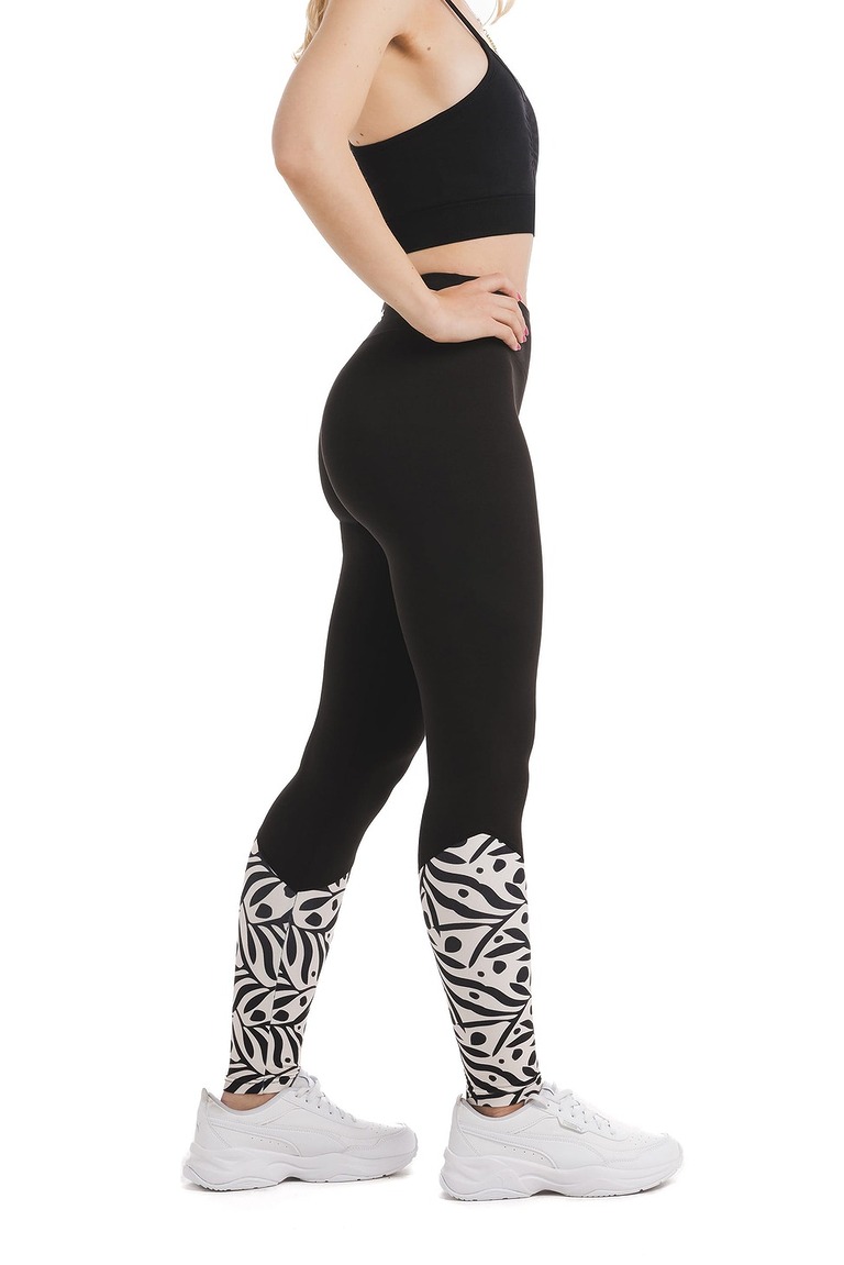 Črne dolge pajkice Zampilo s črnim abstraktnim vzorcem listov in pik na belem ozadju na dnu hlačnic