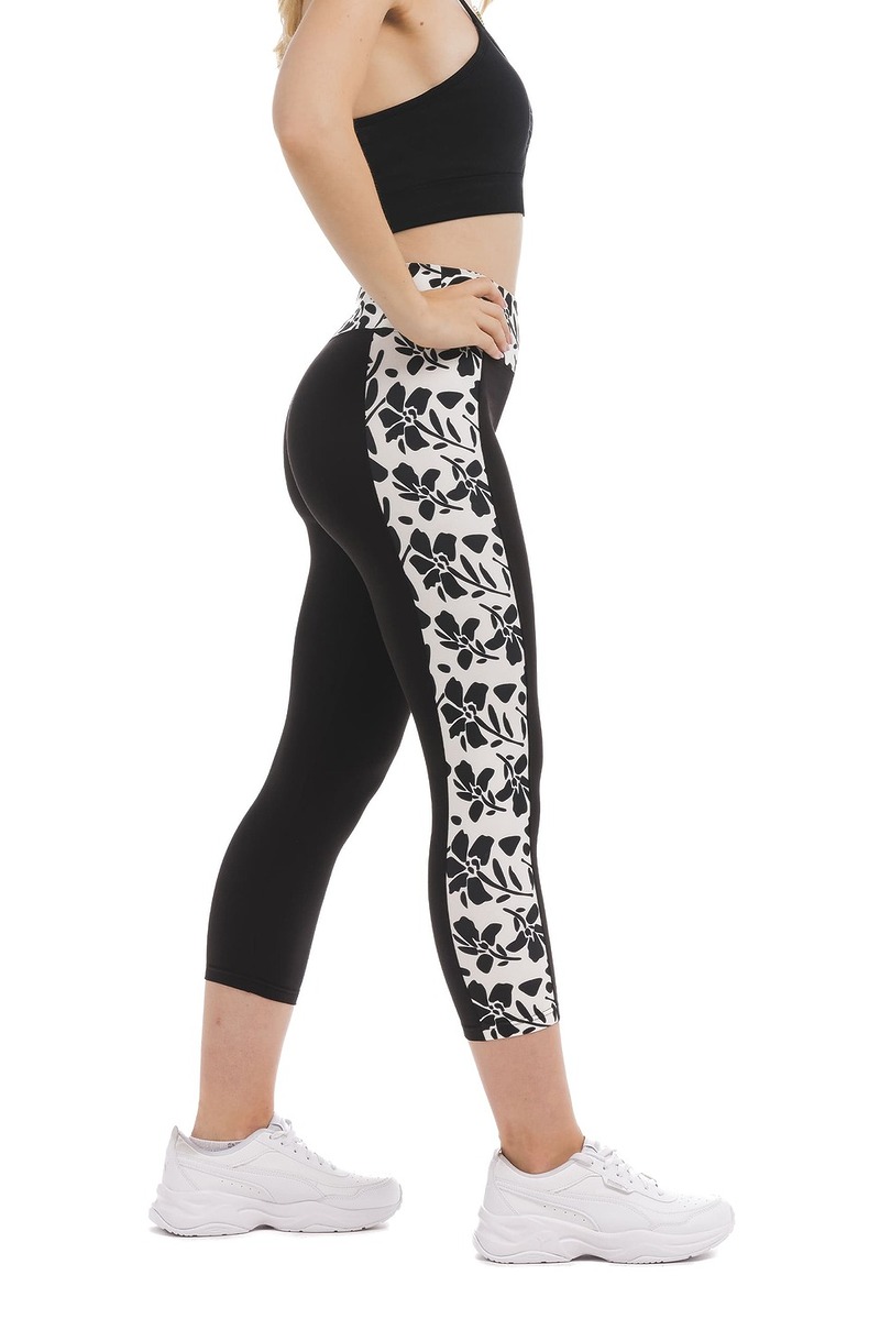 Črne capri pajkice Valore z visokim pasom in črni cvetličnim vzorcem ob strani hlačnic