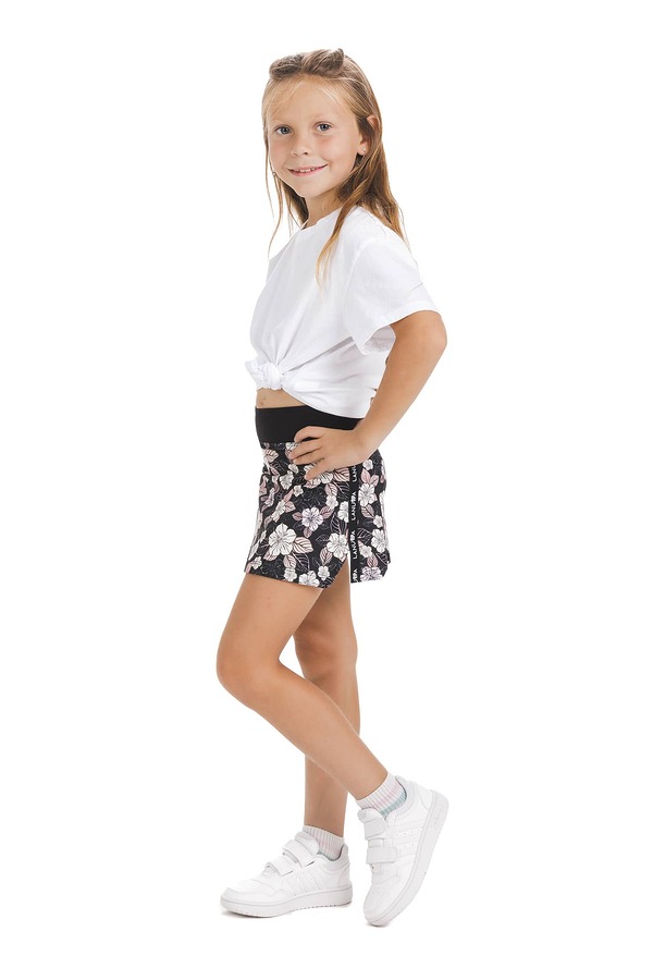 Skort Carita kids – krilo s kratkimi všitimi pajkicami s cvetličnim vzorcem v črni, beli in nežno roza barvi