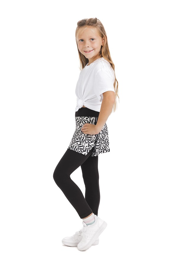Skort Perla kids – krilo z všitimi dolgimi pajkicami z abstraktnim vzorčkom črnih listov