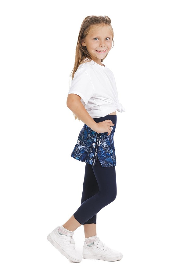 Skort Unicos kids – krilo z všitimi modrimi capri pajkicami in z vzorcem rož Skort Unicos kids - krilo z všitimi modrimi capri pajkicami in z vzorcem rož