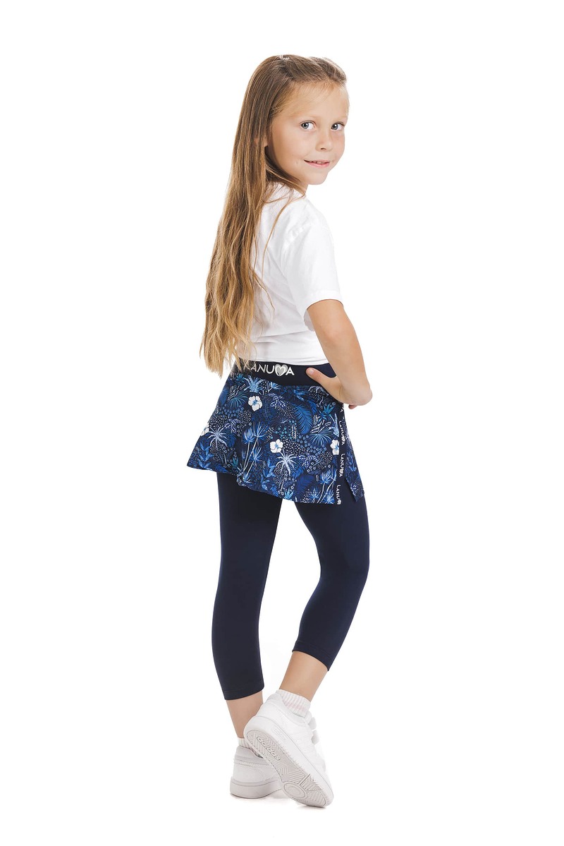Skort Unicos kids - krilo z všitimi modrimi capri pajkicami in z vzorcem rož