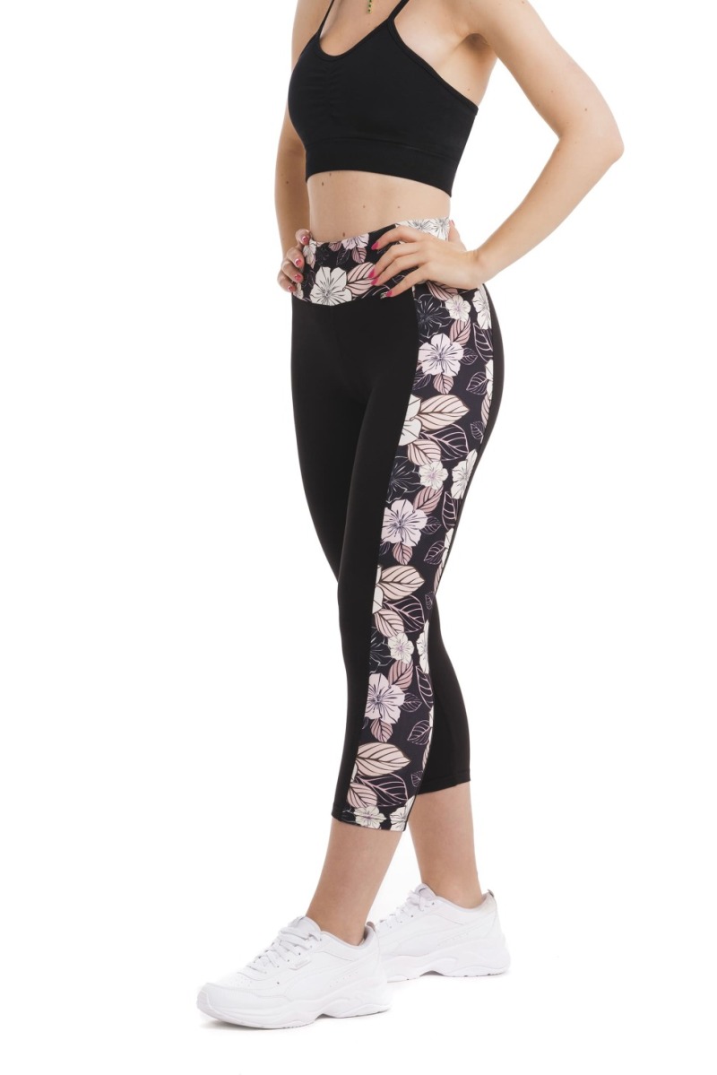 Črne capri pajkice Rosso z rožastim vzrcem v beli, roza in črni barvi ob straneh hlačnic