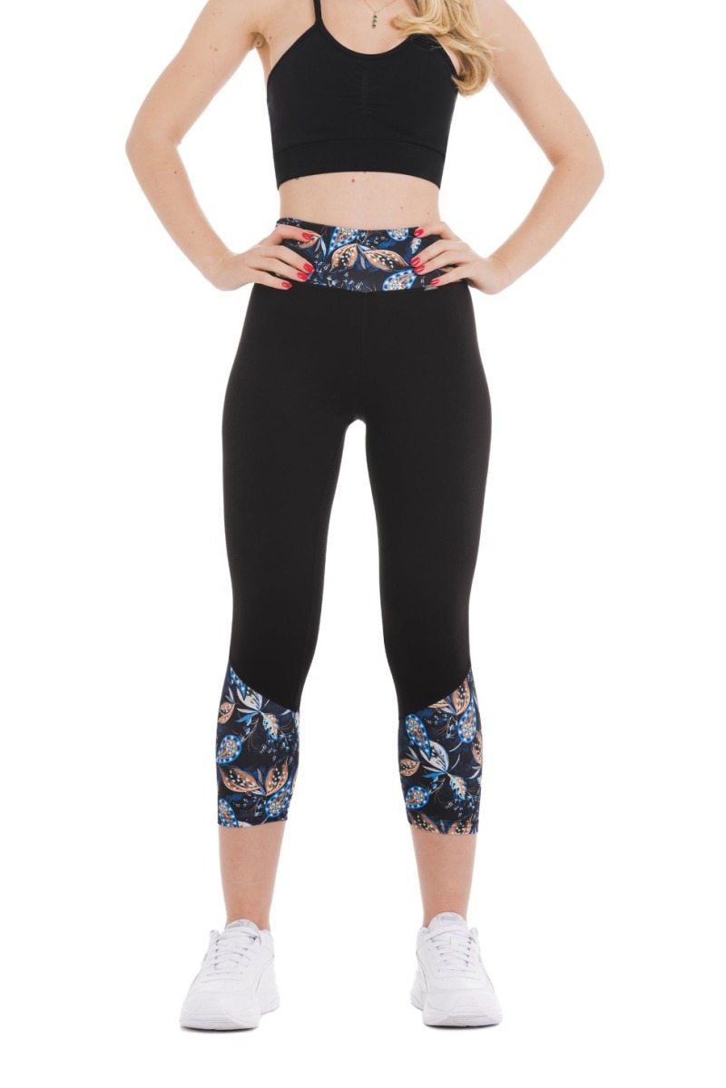 Črne capri pajkice Corallo z barvnim vzorcem listov na dnu hlačnic in na pasu