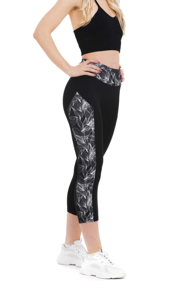 Črne capri pajkice Fabulosy z visokim pasom in abstraktnim belim vzorcem ob straneh hlačnic