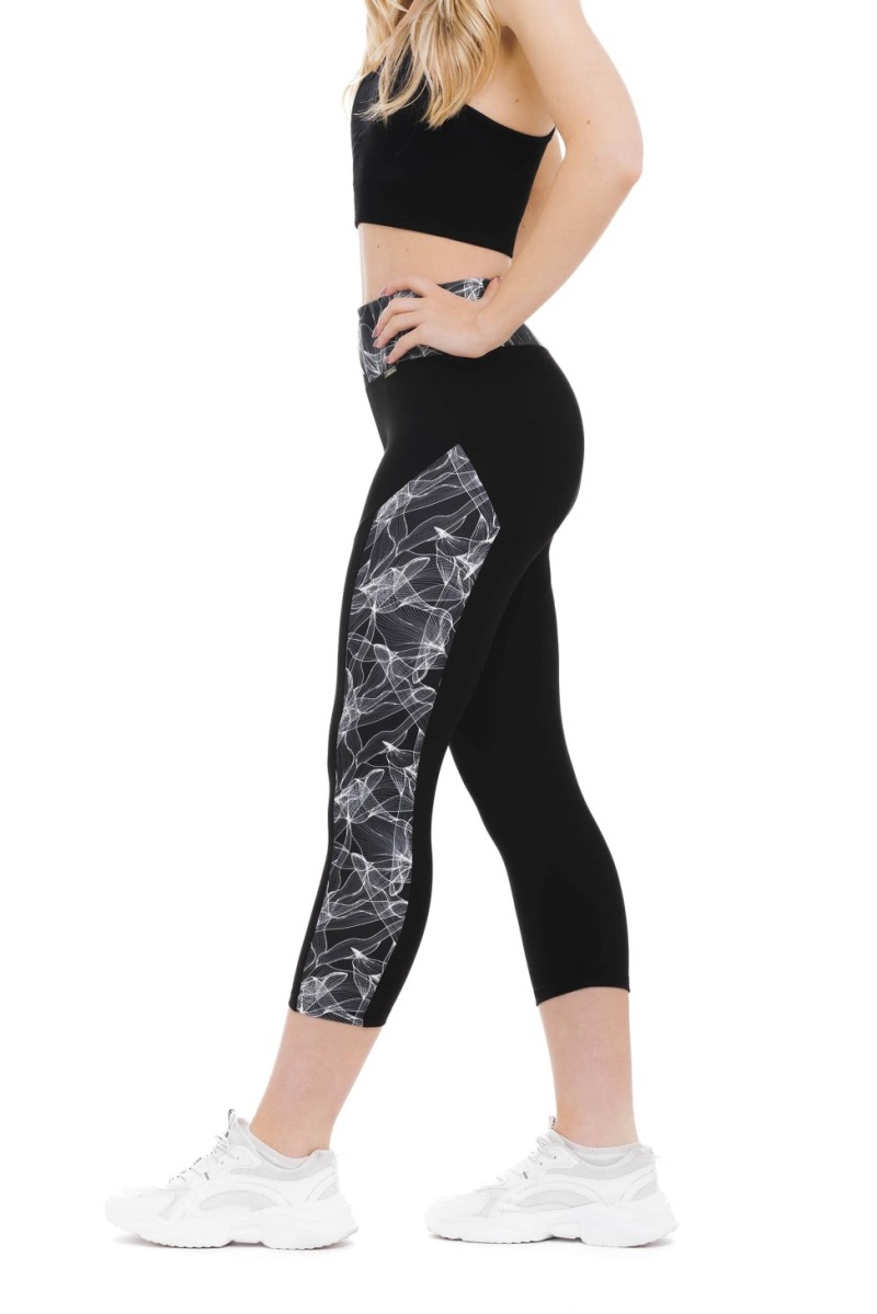 Črne capri pajkice Fabulosy z visokim pasom in abstraktnim belim vzorcem ob straneh hlačnic