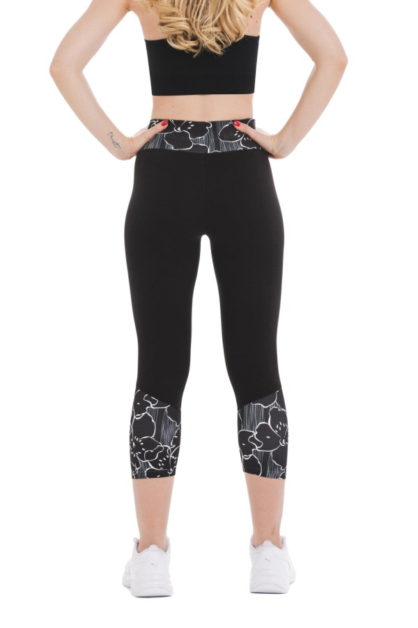 Črne capri pajkice Stella z belimi rožami na dnu hlačnic in na pasu