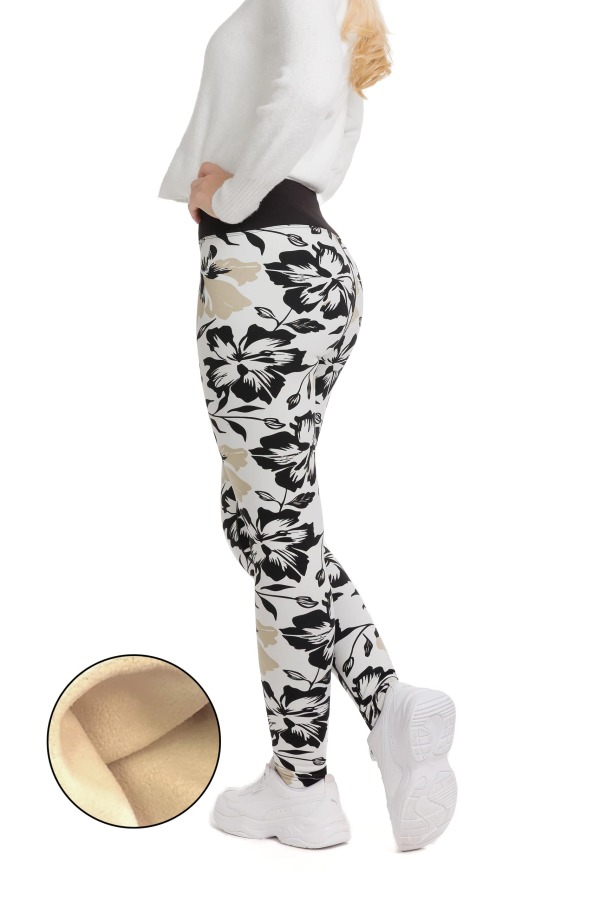 Lanuma ženske podložene thermo pajkice Tova v beli barvi z vzorcem črnih rož in bež listov – elegantne in mehke termo pajkice za zimo.
Lanuma ženske podložene thermo pajkice Tova v beli barvi z vzorcem črnih rož in bež listov – elegantne in mehke termo pajkice za zimo.