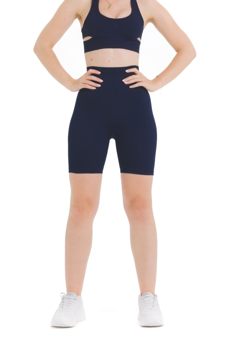 Lanuma Luxe brezšivne pajkice v navy barvi z visokim pasom in push-up učinkom. Raztegljiv seamless material zagotavlja udobno prileganje pri vsakodnevnem nošenju ali treningu.