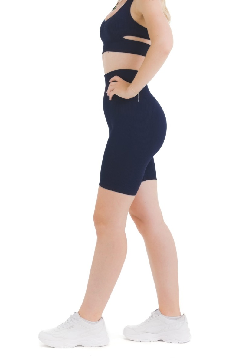 Lanuma Luxe brezšivne pajkice v navy barvi z visokim pasom in push-up učinkom. Raztegljiv seamless material zagotavlja udobno prileganje pri vsakodnevnem nošenju ali treningu.