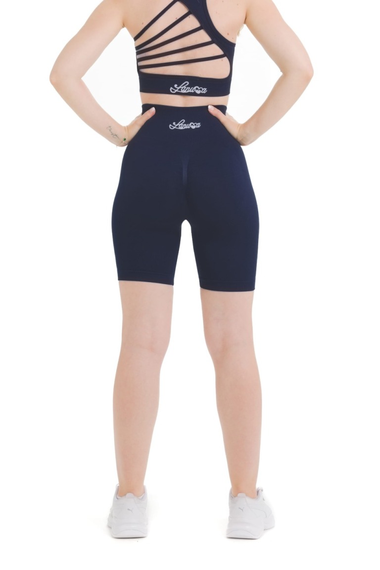 Lanuma Pure brezšivne pajkice v navy barvi z visokim pasom in push-up učinkom. Elastičen seamless material zagotavlja oprijet občutek in udobje pri vsakodnevnem nošenju ali treningu.