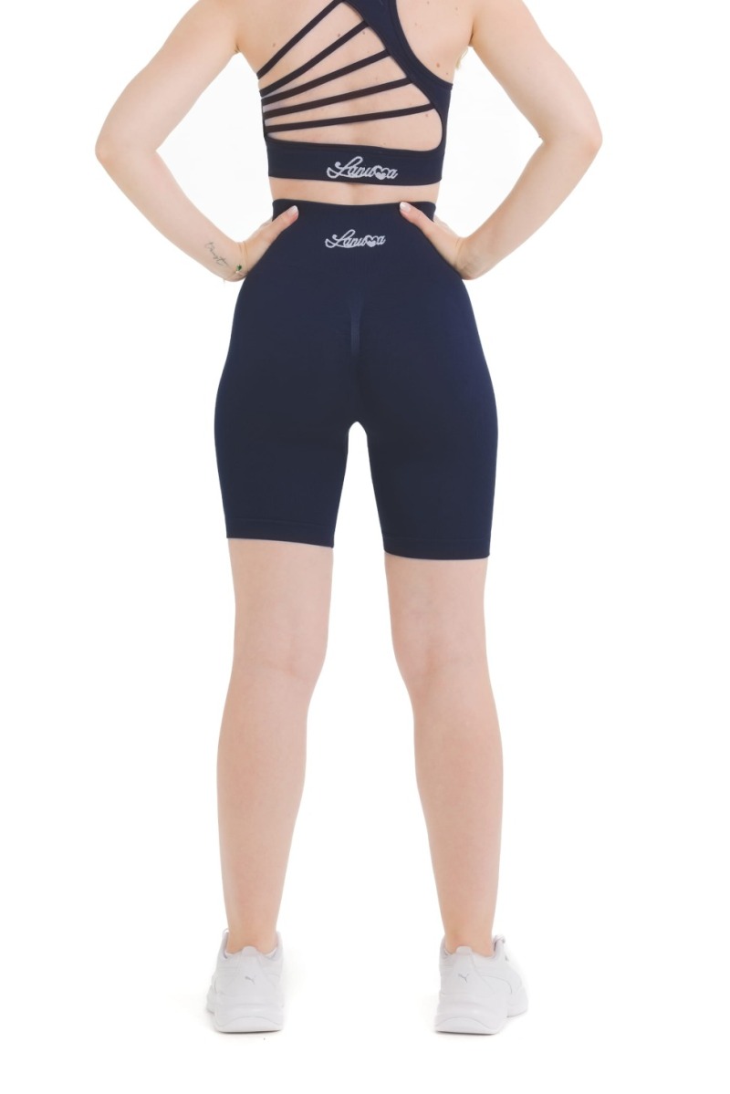 Lanuma Pure brezšivne pajkice v navy barvi z visokim pasom in push-up učinkom. Elastičen seamless material zagotavlja oprijet občutek in udobje pri vsakodnevnem nošenju ali treningu.